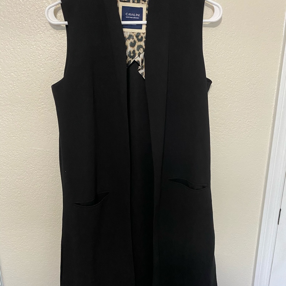 Cuter black vest!